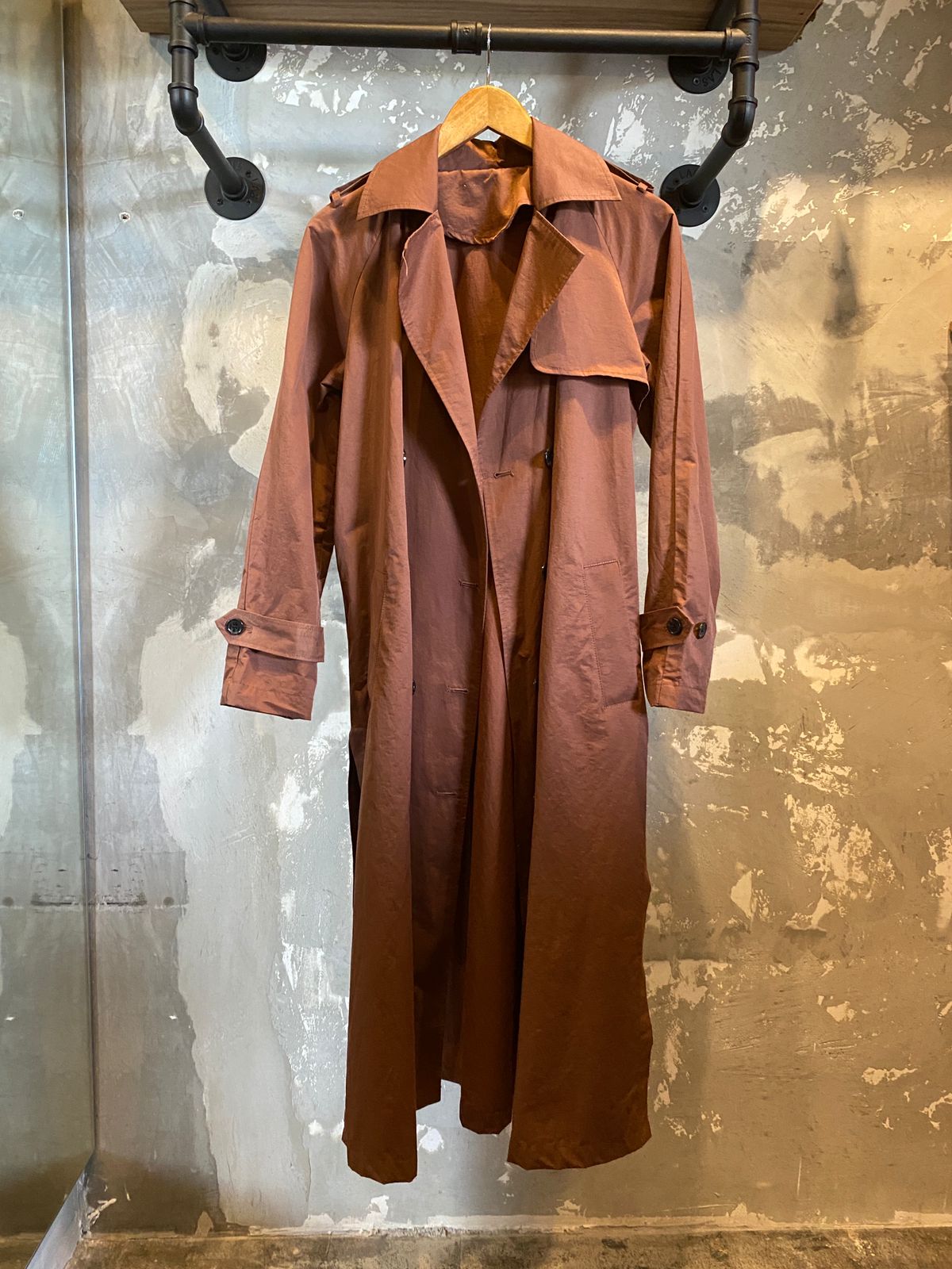 Long Coat Orange Wall